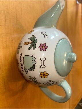 Pusheen Ceramic Teapot with Mint Accents and Floral Motif